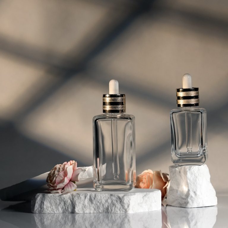 Square clear glass skincare bottles with aluminium droppers