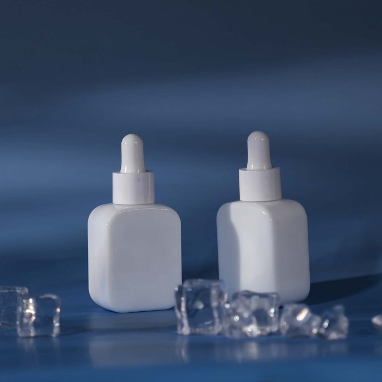 Square white glass skincare bottle with white dropper