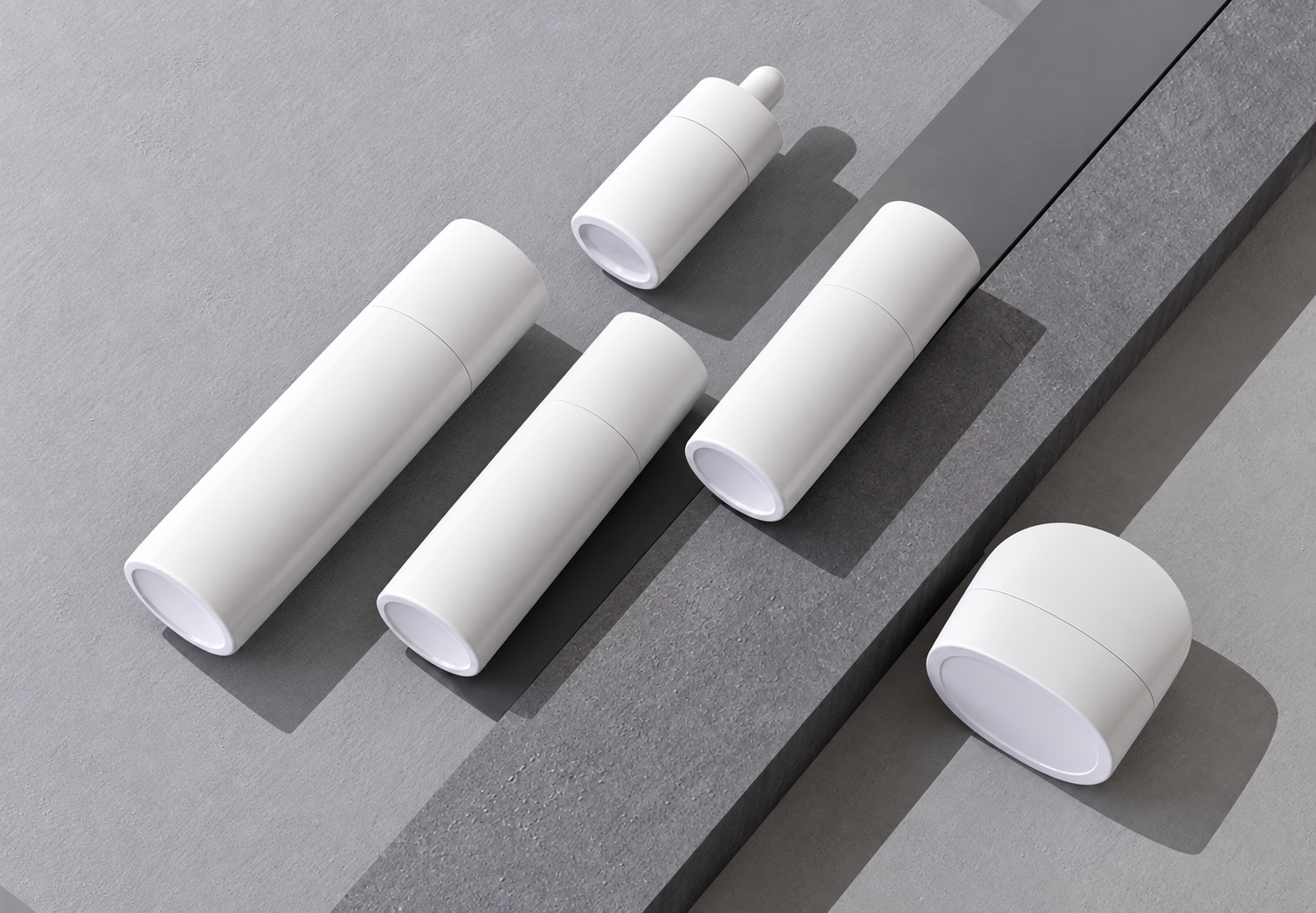 Matte white elliptical skincare bottles and jars